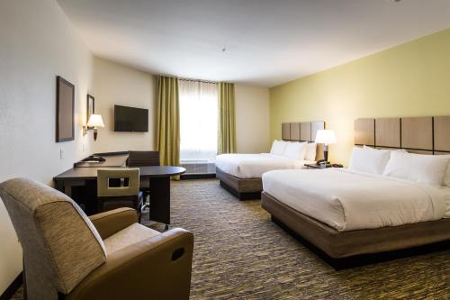 Postel nebo postele na pokoji v ubytování Candlewood Suites - Buda - Austin SW by IHG