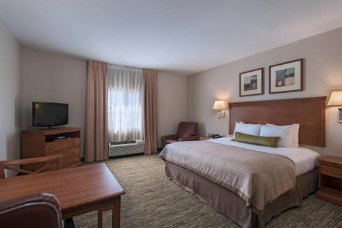 Postel nebo postele na pokoji v ubytování Candlewood Suites Austin North-Cedar Park by IHG