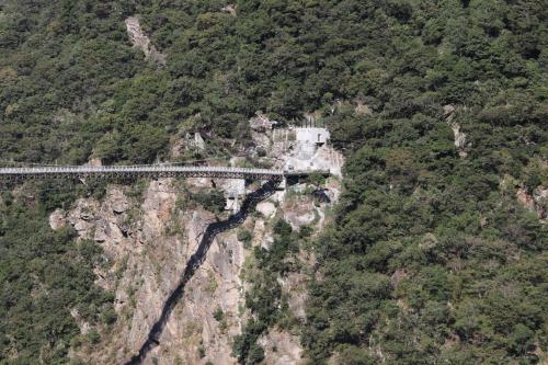 a bridge on the side of a mountain at Yu Shou Hao Hsien Guesthouse in Fushi