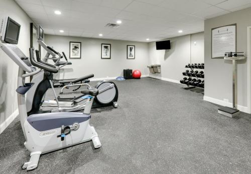 a gym with a treadmill and a tread machine at Staybridge Suites San Antonio - Schertz by IHG in Schertz
