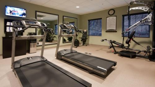 a gym with two tread machines and a treadmill at Staybridge Suites Buffalo-Amherst by IHG in Amherst