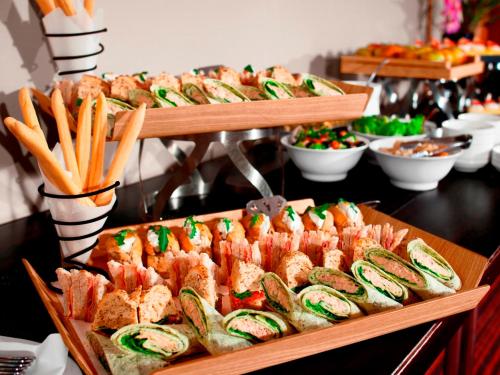 a buffet of sandwiches and other food on a table at Radisson Blu Hotel, Durham in Durham