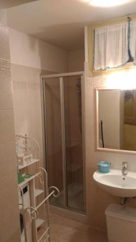 a bathroom with a shower and a sink at Alloggio Castello Tesino in Castello Tesino