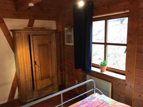 Ένα ή περισσότερα κρεβάτια σε δωμάτιο στο Ferienwohungen Gibbesbachhof