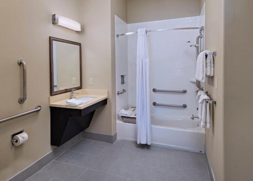 a bathroom with a sink and a shower at Staybridge Suites Austin Northwest by IHG in Austin