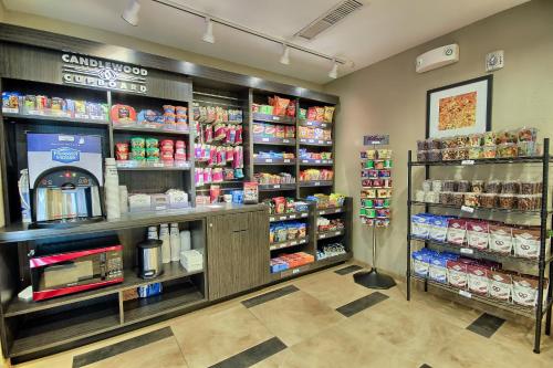 a grocery store aisle with shelves of food at Candlewood Suites Columbus - Grove City by IHG in Grove City