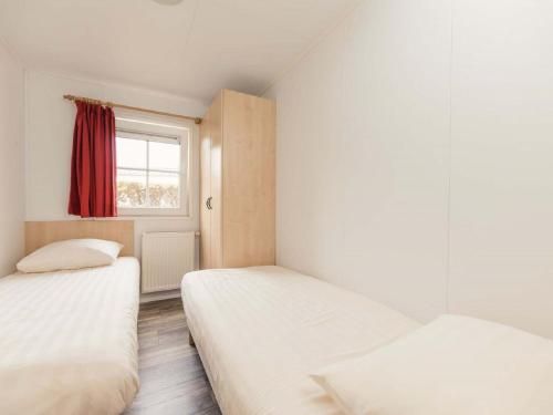 Postel nebo postele na pokoji v ubytování Chalet Buitenplaats Holten 3