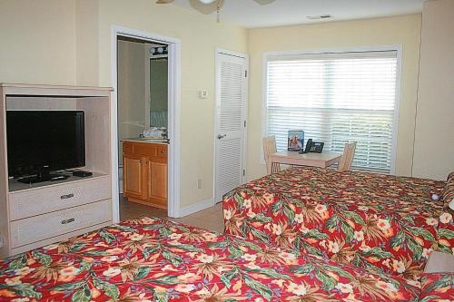 Voodi või voodid majutusasutuse Brunswick Plantation Ground Floor 2503L toas