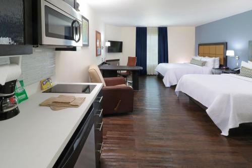 Postel nebo postele na pokoji v ubytování Candlewood Suites - Queretaro Juriquilla by IHG