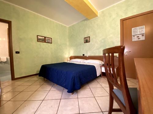 Ein Bett oder Betten in einem Zimmer der Unterkunft Sole della Franciacorta - Hotel & Restaurant