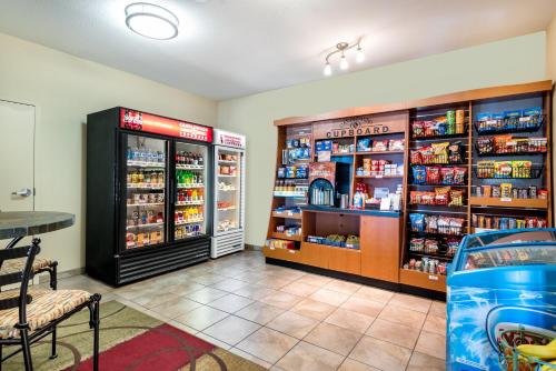 a grocery store with a lot of food and drinks at Candlewood Suites Rocky Mount by IHG in Rocky Mount