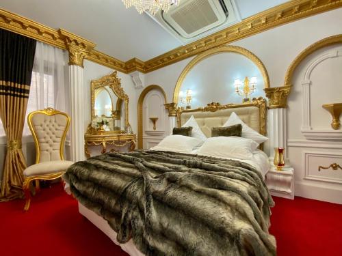 A bed or beds in a room at President Luxury