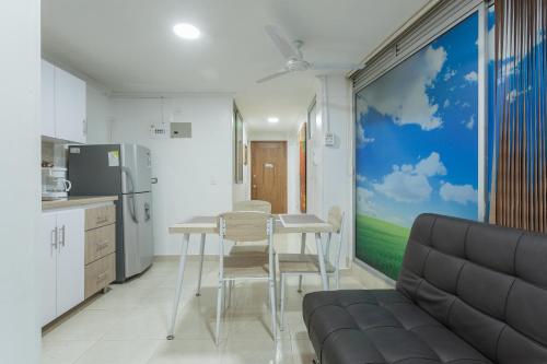 Ein Sitzbereich in der Unterkunft Apartamentos Amoblados JG de la 70