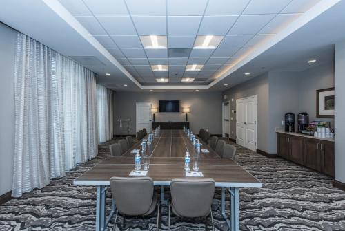a large conference room with a long table and chairs at Staybridge Suites Charleston - Mount Pleasant by IHG in Charleston