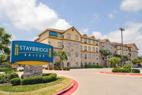 a sign in front of a building at Staybridge Suites Corpus Christi by IHG in Corpus Christi