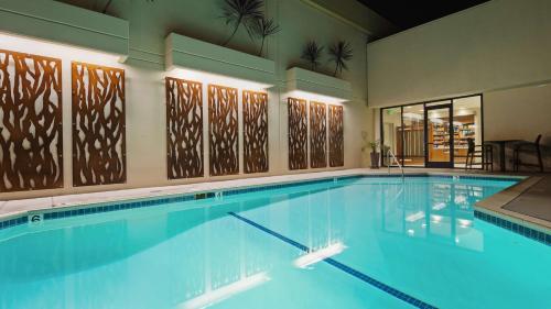a large swimming pool in a building at Best Western Plus Bayside Inn in San Diego