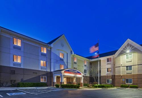a rendering of the front of a hotel at Candlewood Suites Owasso by IHG in Owasso