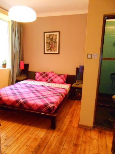 Postel nebo postele na pokoji v ubytování Orient Express Guest House