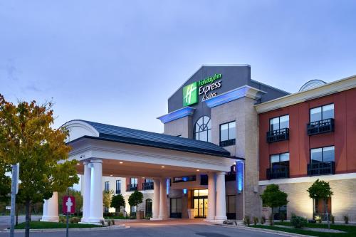 a hotel with a sign on the front of it at Holiday Inn Express Hotel & Suites Dieppe Airport by IHG in Moncton