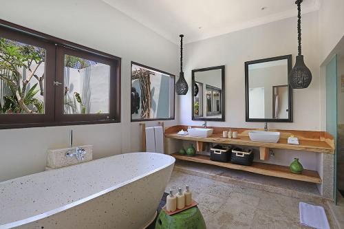 Et badeværelse på Nunamkhalu Private Villa and Spa