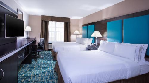 Ένα ή περισσότερα κρεβάτια σε δωμάτιο στο Holiday Inn Express & Suites Wyomissing, an IHG Hotel