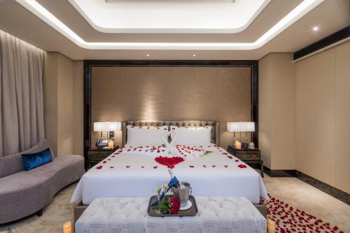 Un ou plusieurs lits dans un hébergement de l'établissement Narcissus Al Hamra Hotel Jeddah