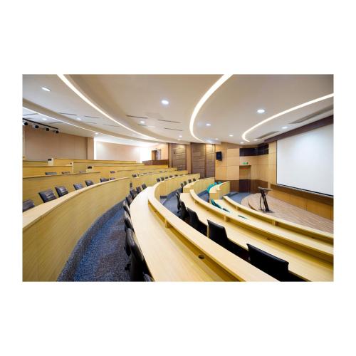a lecture hall with rows of chairs and a screen at Summit Ridge Tagaytay - Newly Renovated in Tagaytay