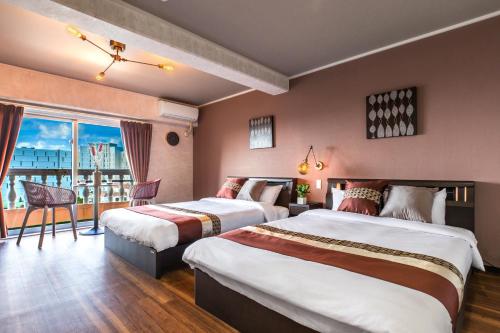 Postel nebo postele na pokoji v ubytování Onnason Prince Plage 1003