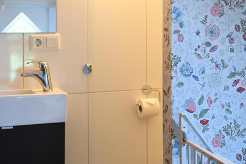 
Een badkamer bij B&B & vakantiewoningen - Buitenverblijf Huiskenshof Zuid-Limburg
