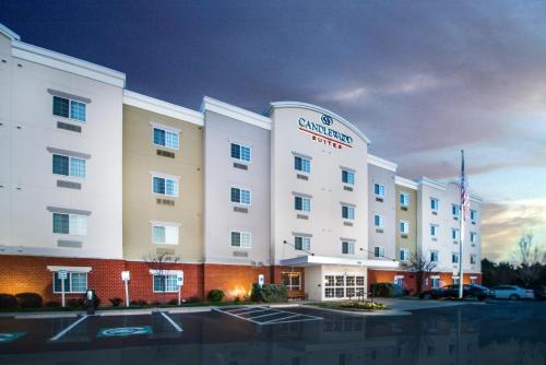 a rendering of the guilford hotel at night at Candlewood Suites Wake Forest-Raleigh Area by IHG in Wake Forest