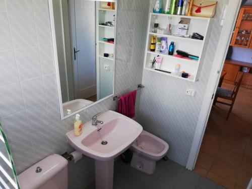 a bathroom with a sink and a toilet at La Marina Solo Familias!!! Serviplaya in Playa de Xeraco