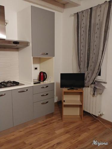 Η κουζίνα ή μικρή κουζίνα στο Appartamento Masha Como