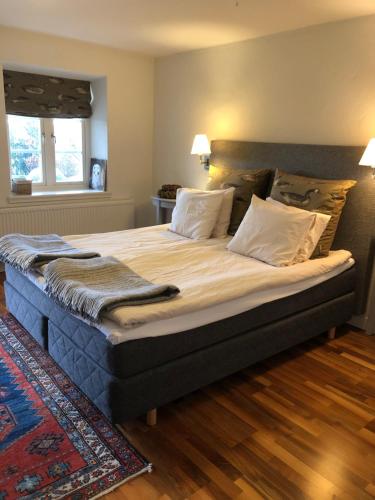 Säng eller sängar i ett rum på Glimminge Bed & Breakfast