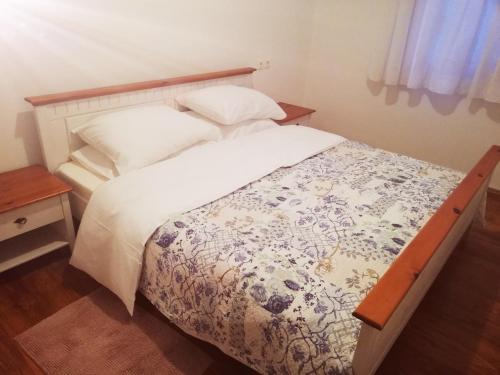 Ένα ή περισσότερα κρεβάτια σε δωμάτιο στο Apartment Jujube-IQM Destination Quality