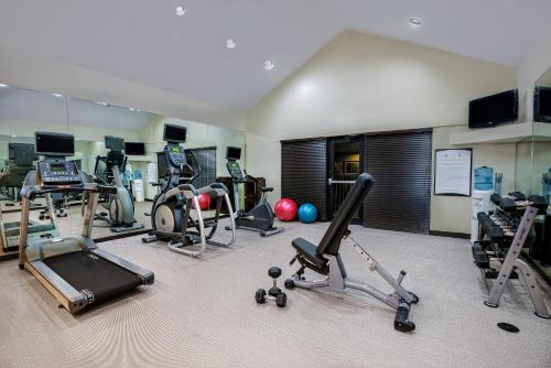 a gym with several exercise equipment in a room at Staybridge Suites Lubbock-University Area by IHG in Lubbock