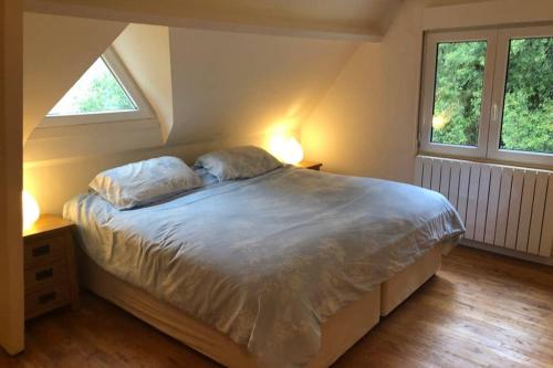 En eller flere senge i et værelse på La Vue D'Or