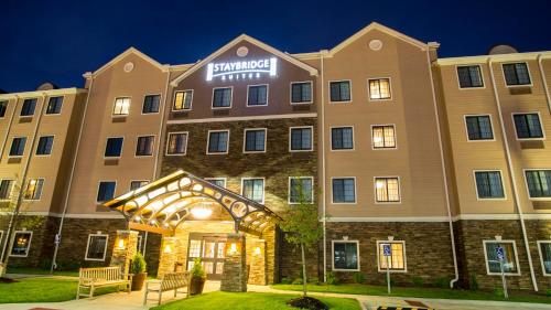 a rendering of the courtyard hotel at night at Staybridge Suites Lexington by IHG in Lexington