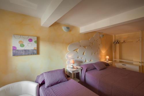 Ένα ή περισσότερα κρεβάτια σε δωμάτιο στο Rome Kings Suite