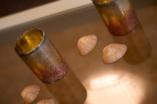 a group of three glass spoons sitting on a table at Paradise Vezal in Laganas