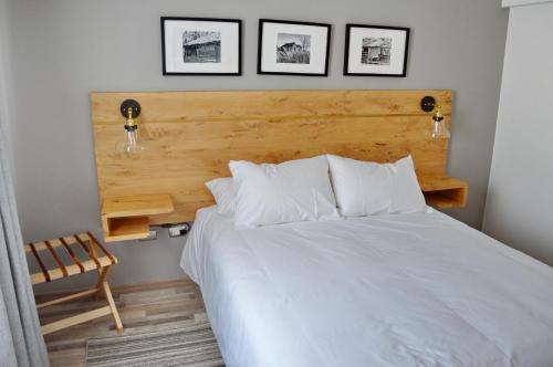 Postel nebo postele na pokoji v ubytování Hotel Cinco Tierras