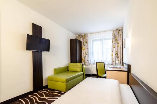 Χώρος καθιστικού στο Hotel Demas München-Unterhaching