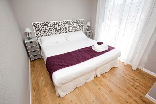 Posteľ alebo postele v izbe v ubytovaní Apartamentos Golf Place