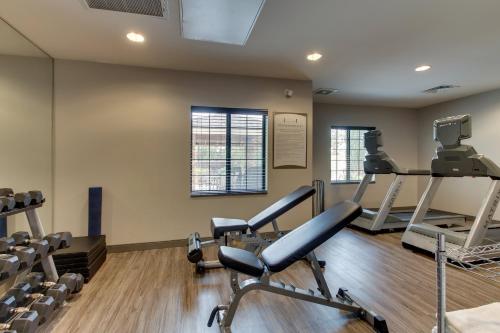 a gym with treadmills and weights in a room at Staybridge Suites Missoula by IHG in Missoula