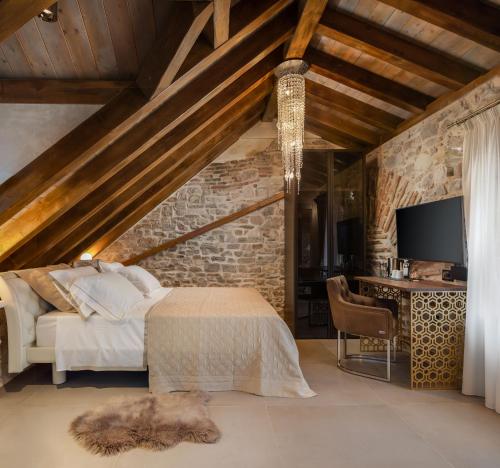 TV a/nebo společenská místnost v ubytování Luxury Rooms MA de Dominis
