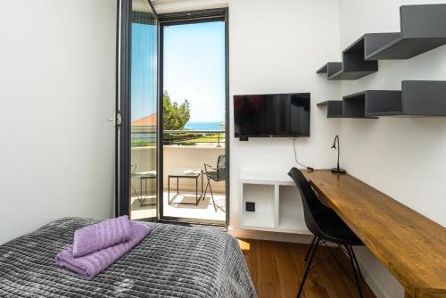 Postel nebo postele na pokoji v ubytování Saint Blaise Luxury Suite