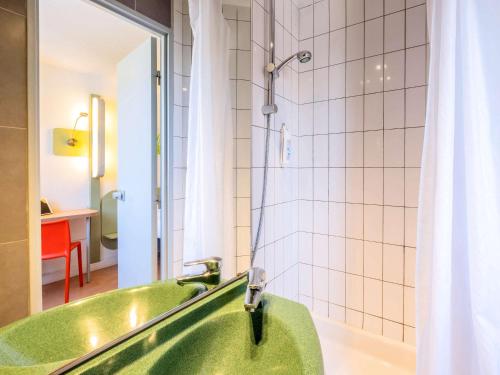 
Ванная комната в ibis budget Limoges

