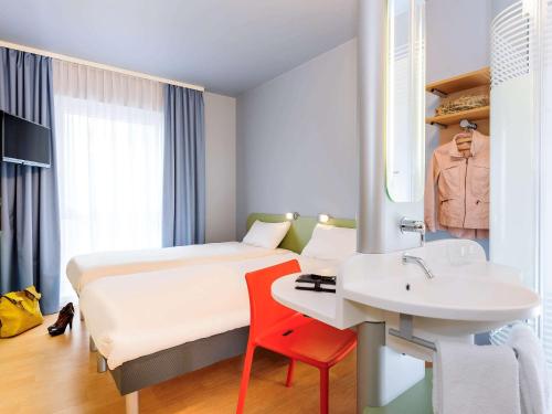 Postel nebo postele na pokoji v ubytování Ibis Budget Bamberg