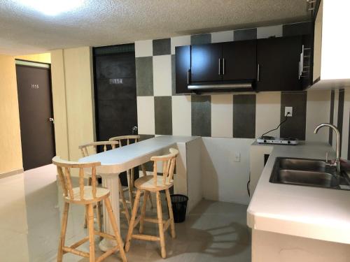 Kuchyň nebo kuchyňský kout v ubytování Hotel Morelia In
