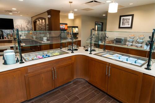 a kitchen with a counter with a sink at Staybridge Suites - Newark - Fremont by IHG in Newark