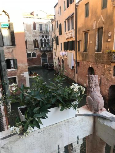 a view of a canal from a balcony in a city at Ca' Amadi in Venice